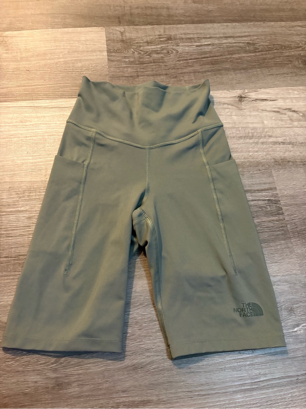 The North Face Women's Sage Green High-Rise Bike Shorts with Pockets